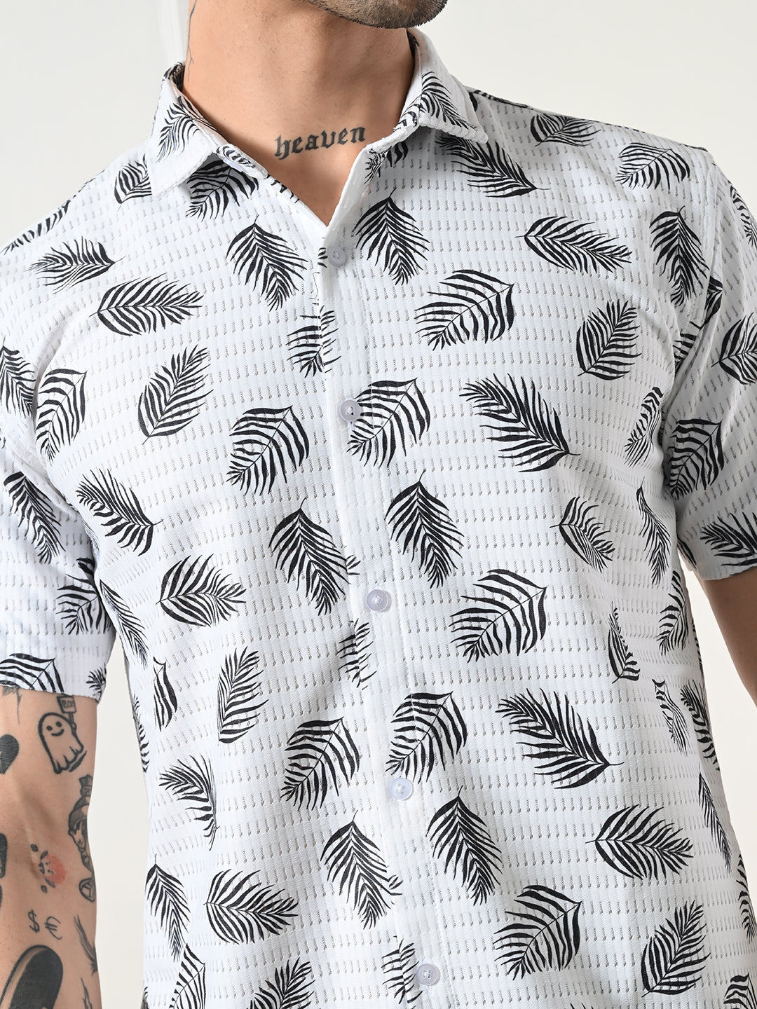 Men's white and black leaf print shirt.