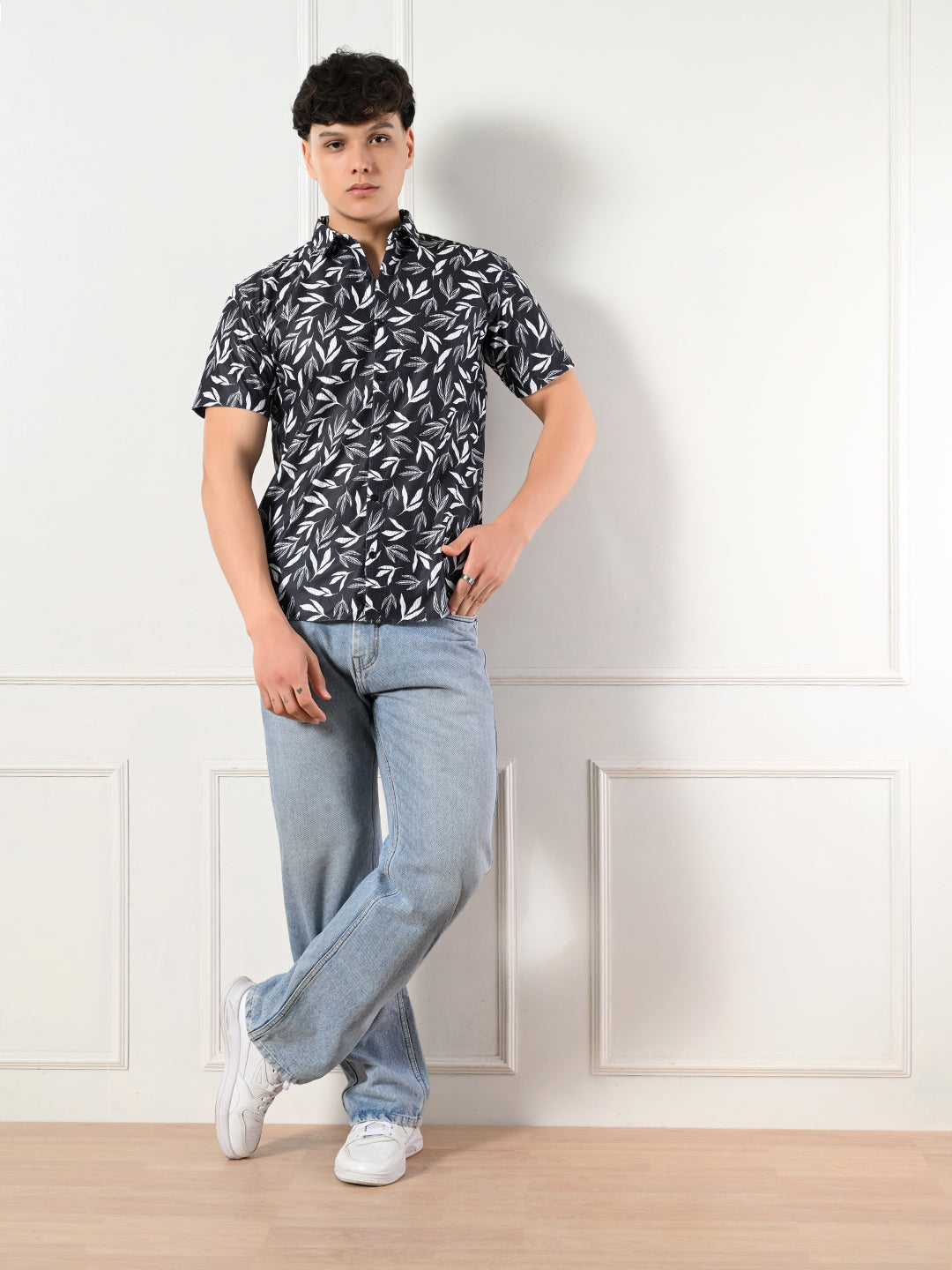 Men's black, white leaf print shirt.