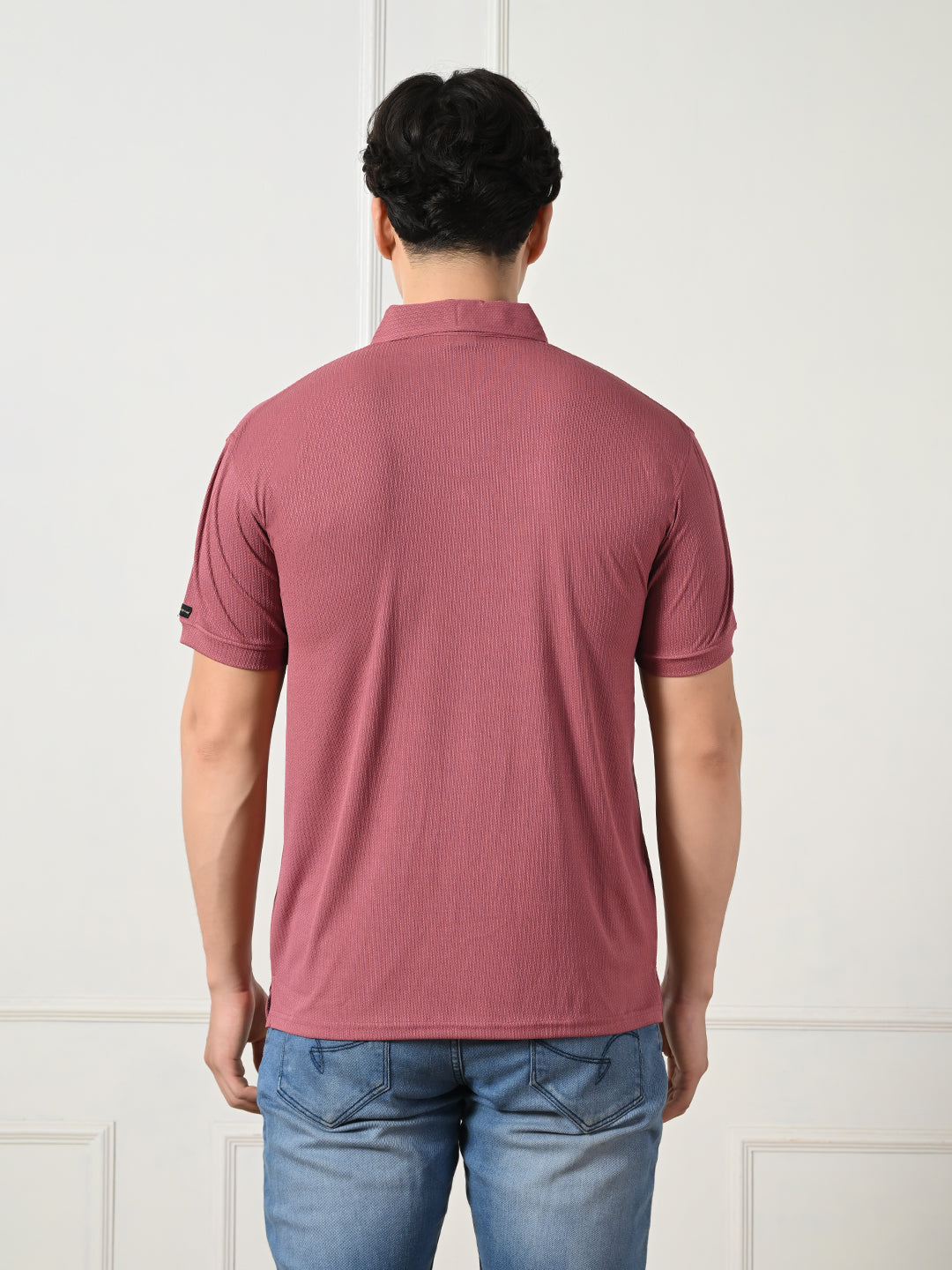 Men's maroon textured polo for everyday wear.