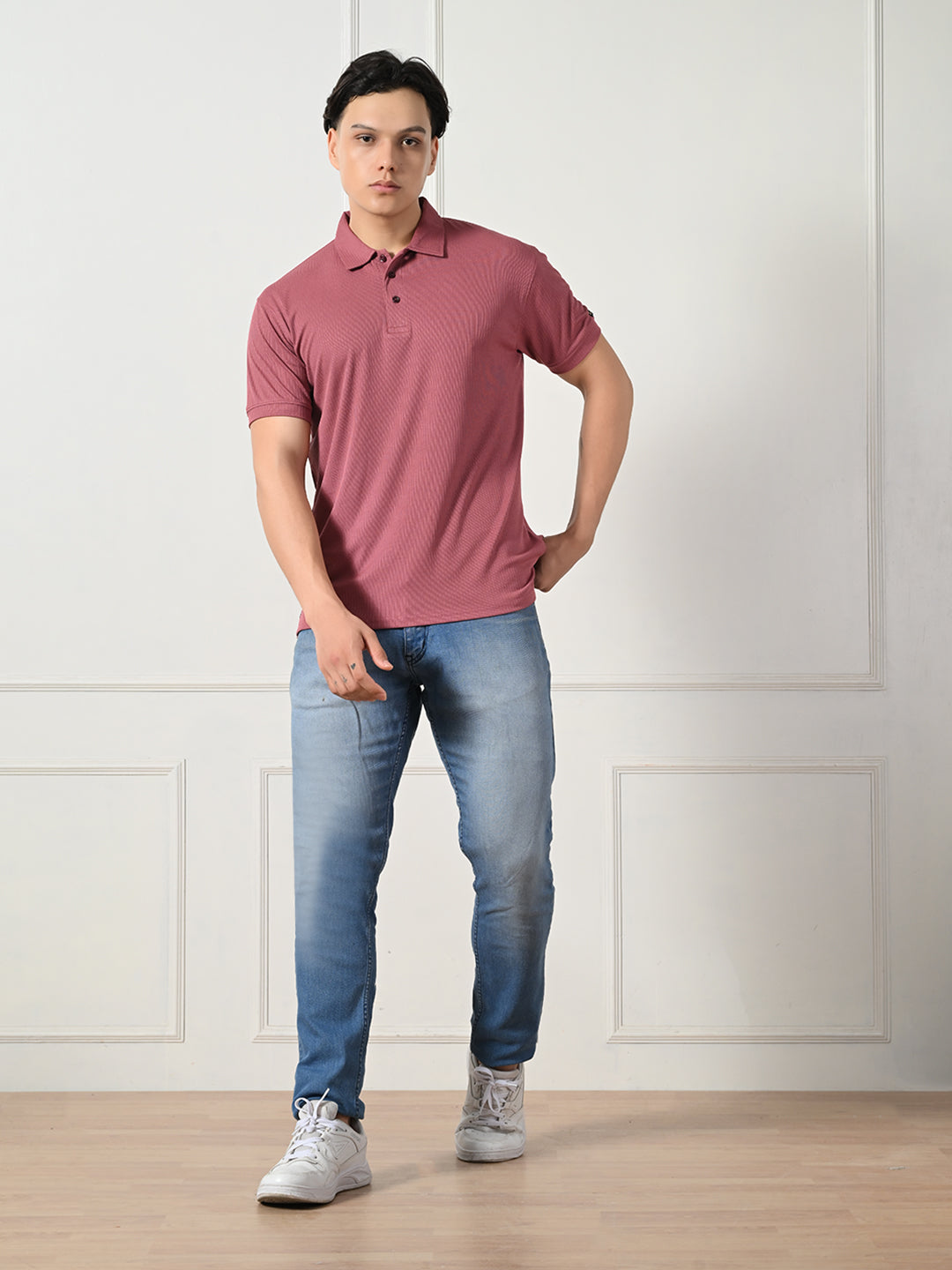 Men's maroon textured polo for everyday wear.