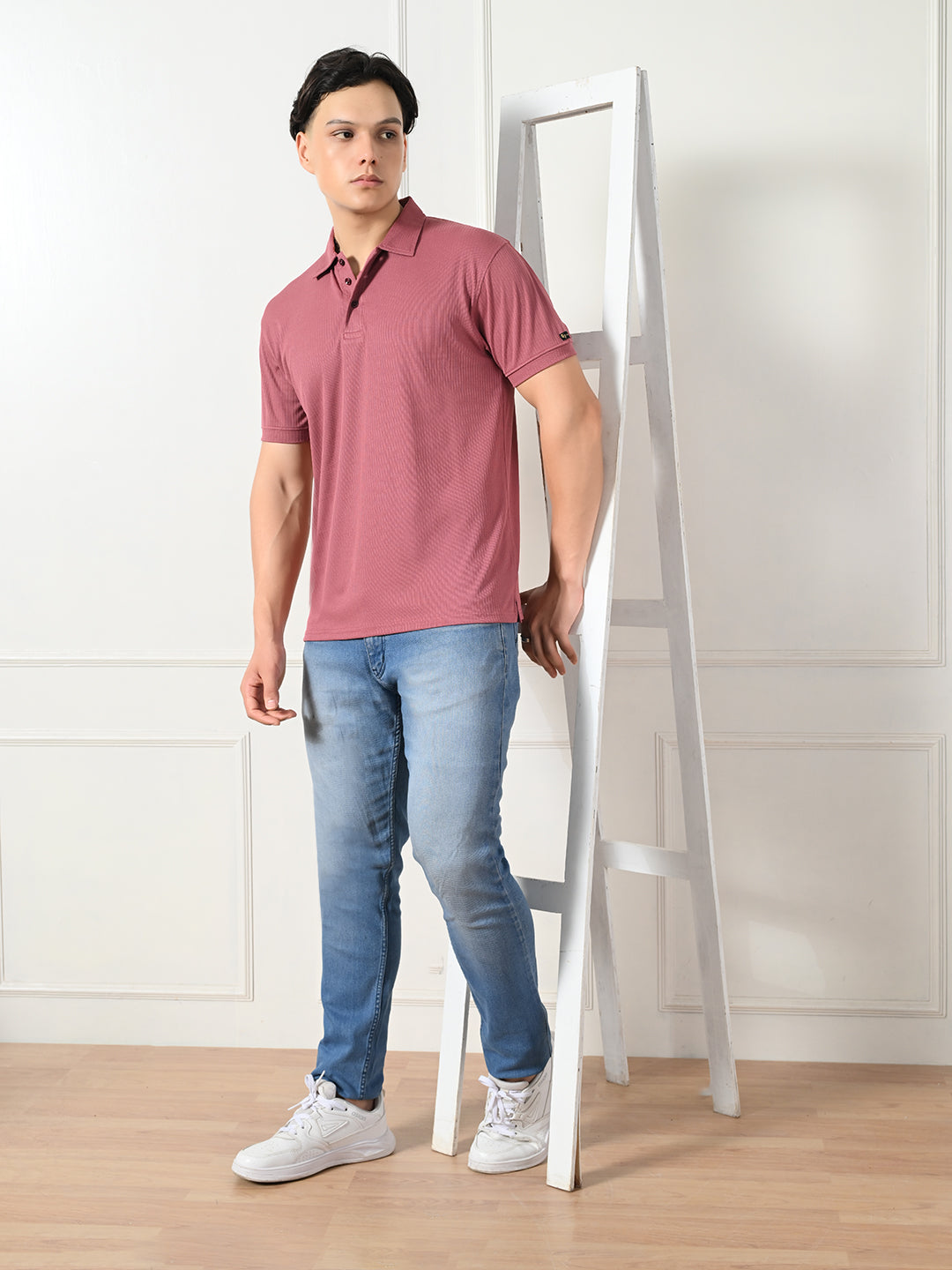 Men's maroon textured polo for everyday wear.