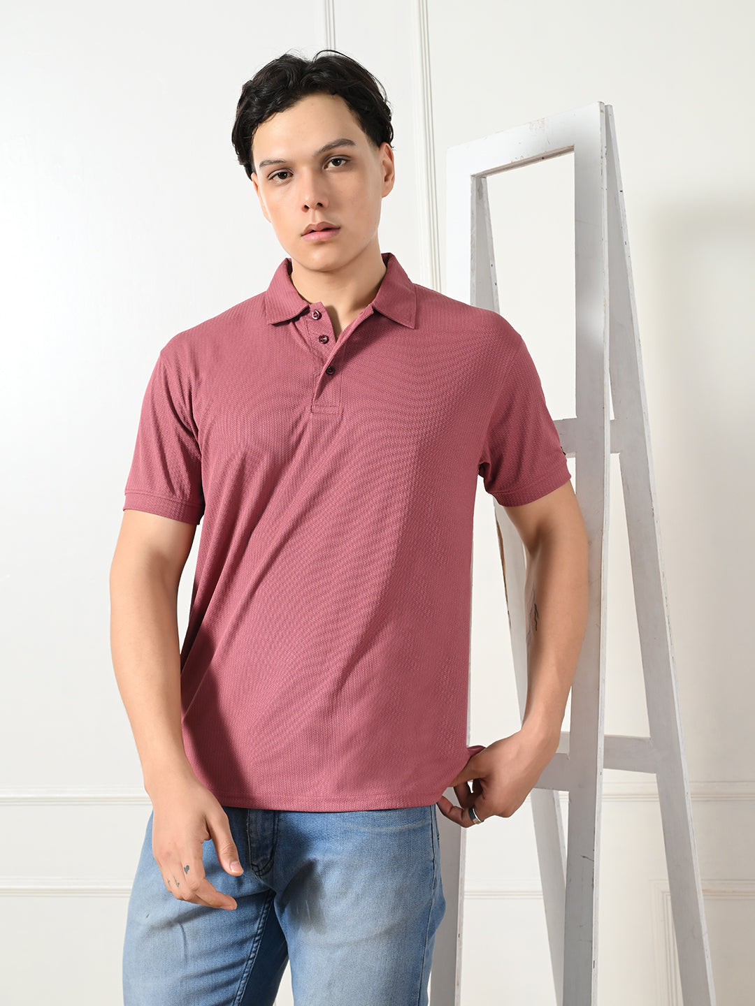 Men's maroon textured polo for everyday wear.