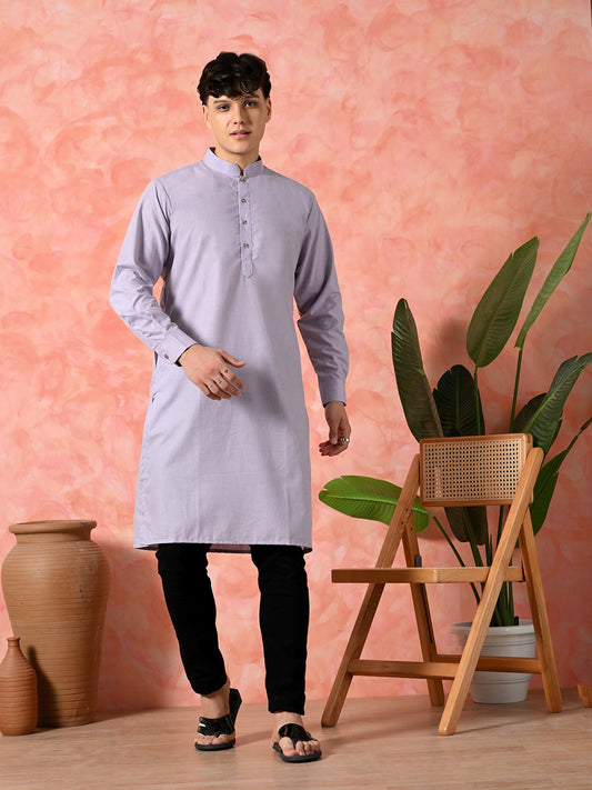 Men's elegant light purple kurta with black pyjamas.