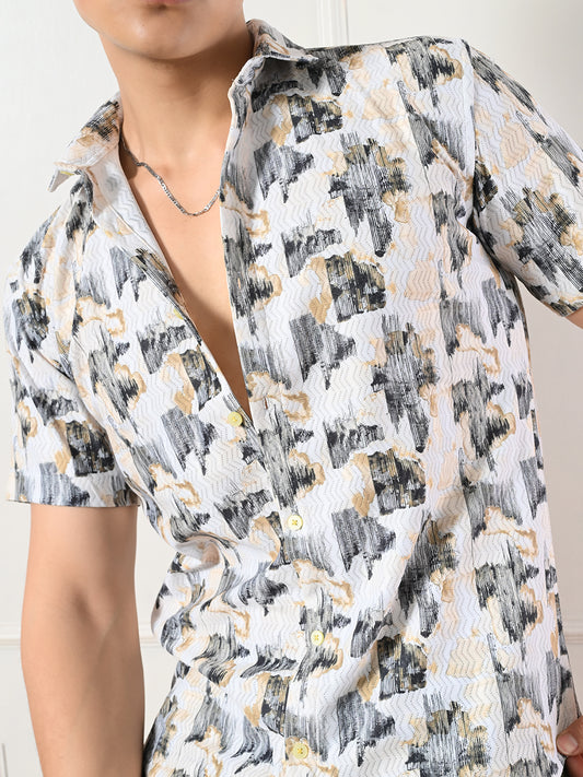 Men's white, earth-tone brushstroke print shirt.