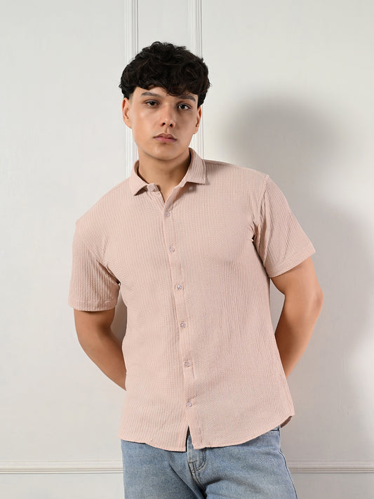 Men's blush pink, beige textured short sleeve shirt.