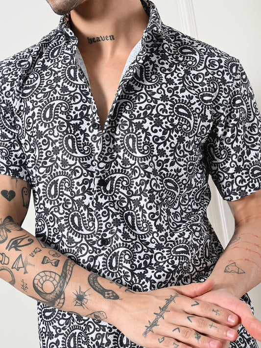 Men's black and white paisley print shirt.
