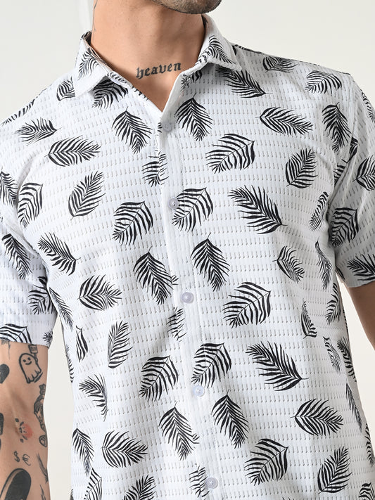 Men's white and black leaf print shirt.