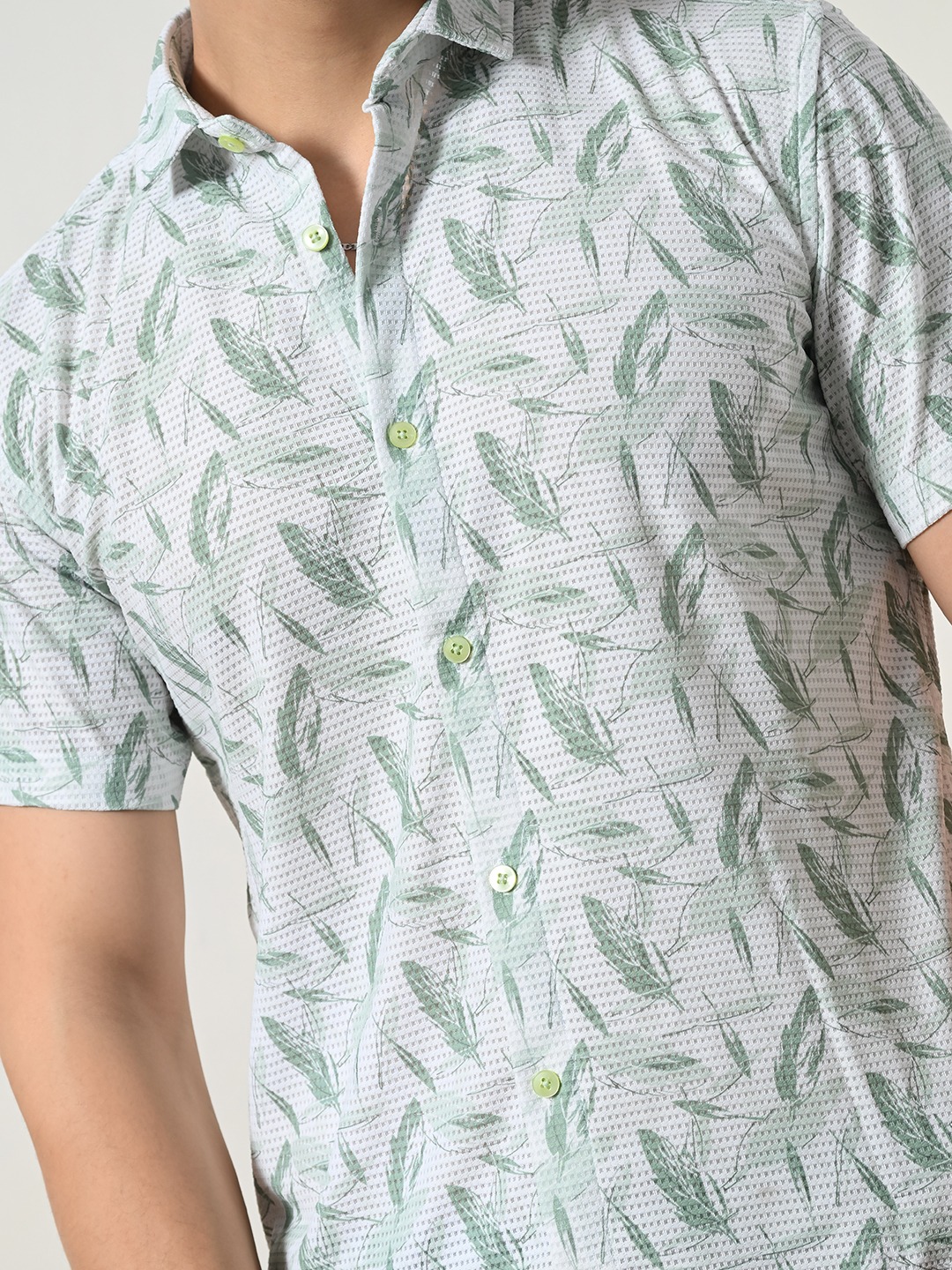 Men’s refreshing light blue, green leaf shirt.