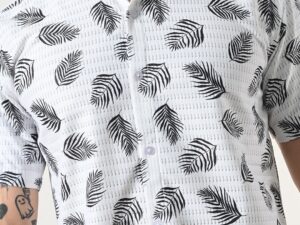 Men's white and black leaf print shirt.